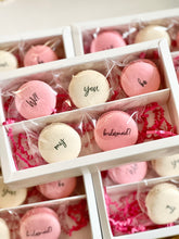 Load image into Gallery viewer, “Will you be my bridesmaid/maid of honor” proposal macaron set. Packaged in set of 5 with pink crinkle paper
